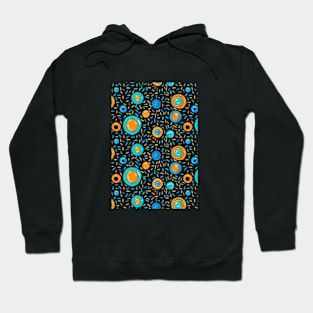 Vibrant orange and teal circles are scattered amidst an intricate array Hoodie